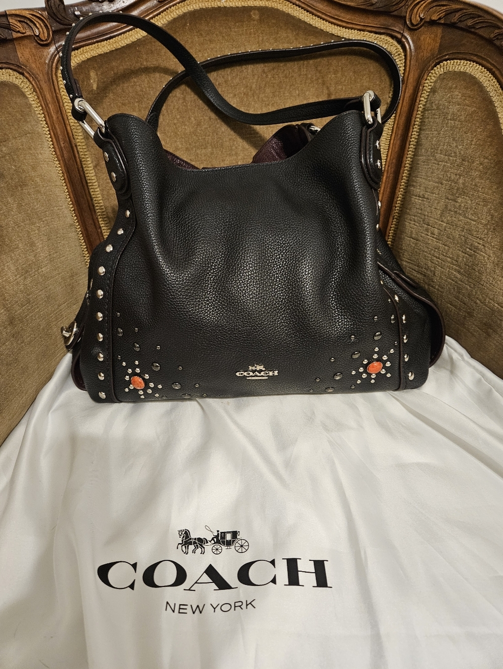 Coach Black Pebble Leather Shoulder Bag with Studs and Orange Accents